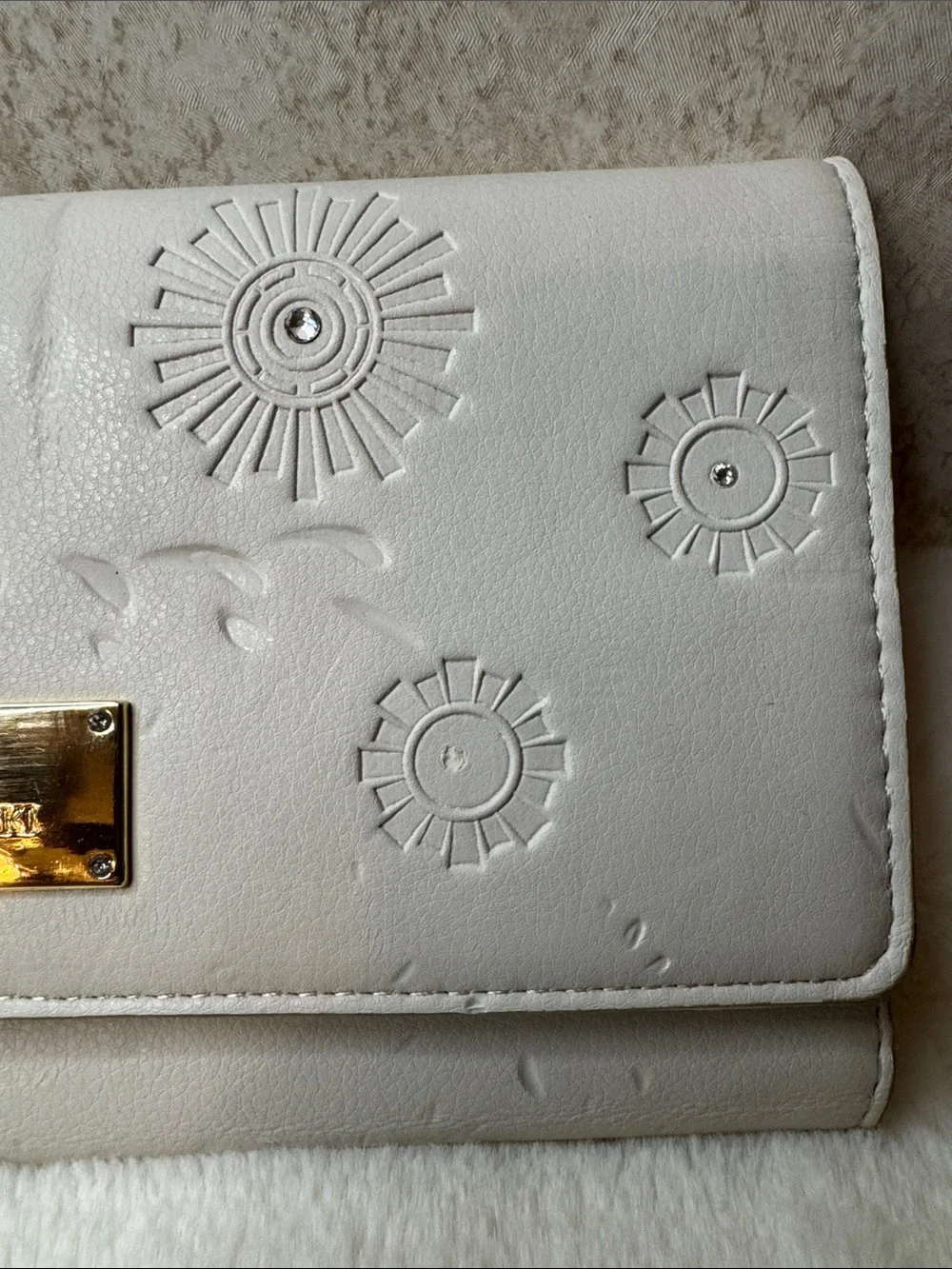 Swarovski Ivory Embossed Floral Wristlet Clutch